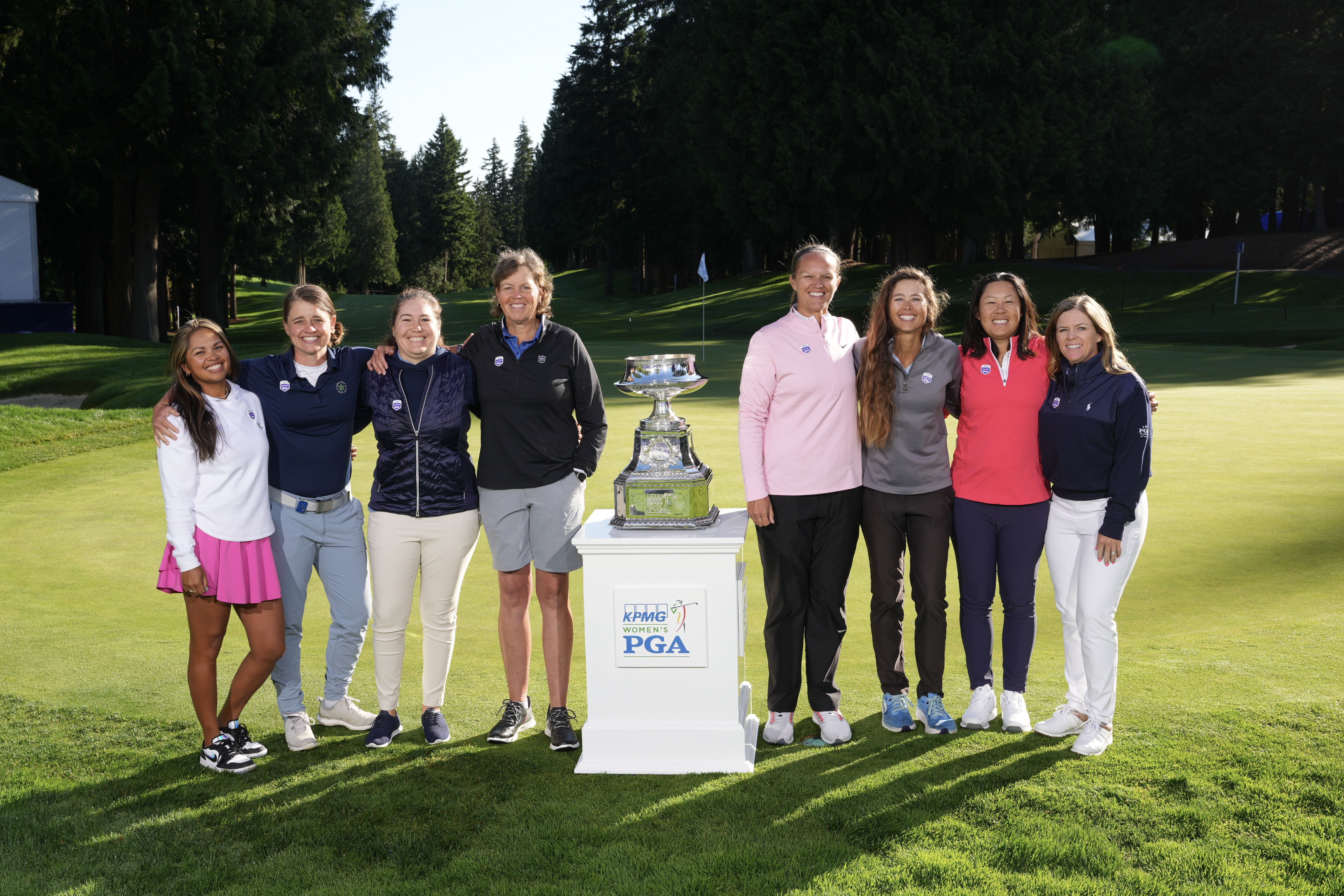 Corebridge Financial team members Kim Paez, Allie White, Samantha Morrell, Wendy Ward, Jennifer Borocz, Allie Knight, Sandra Changkija, and Stephanie Connelly-Eiswerth pose together during the KPMG Women's PGA Championship at Sahalee Country Club on Wednesday, June 19, 2024 in Sammamish, Washington. (Photo by Darren Carroll/PGA of America)