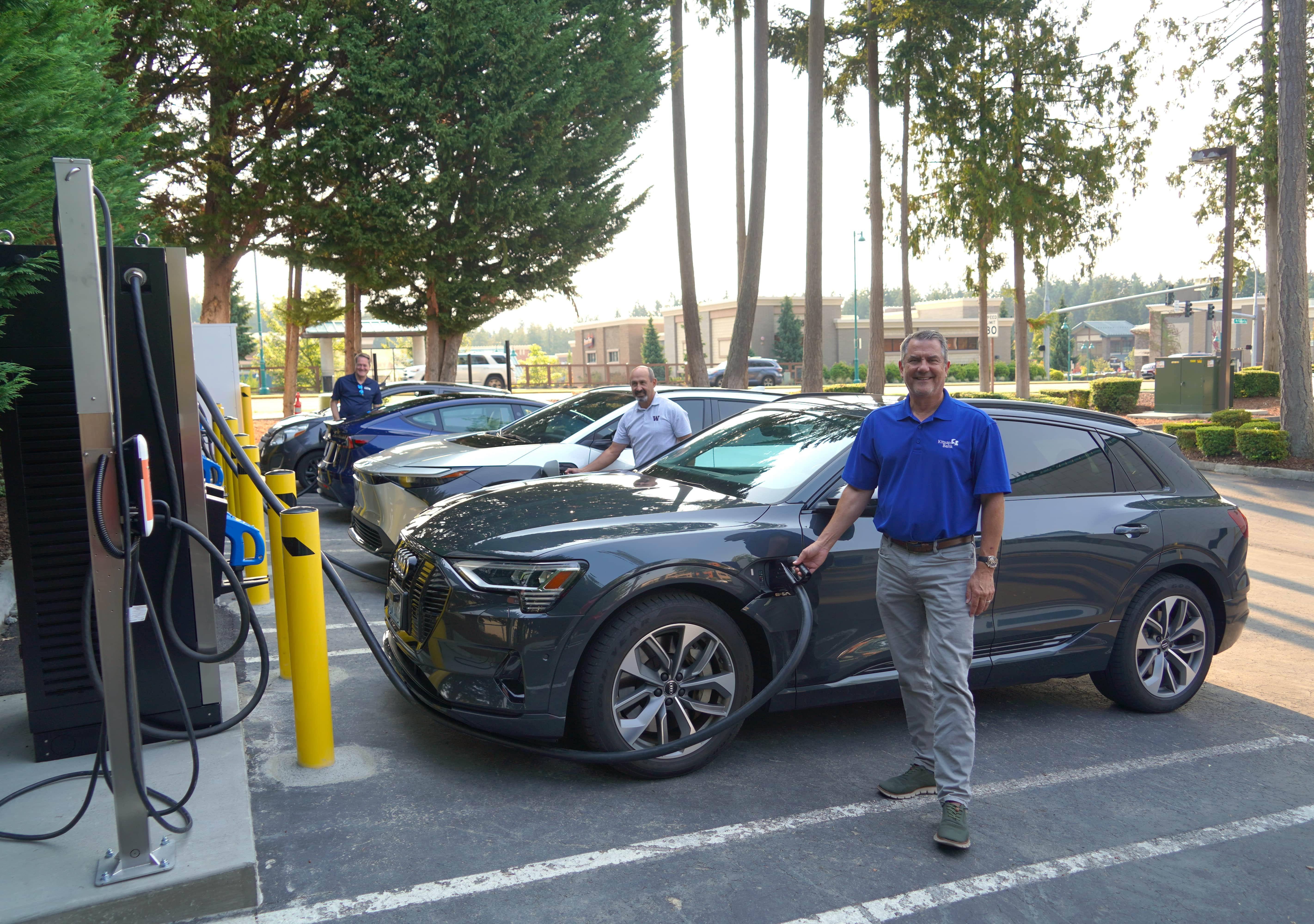 Charging their cars in the photo are the following from Kitsap Bank: Tony George, President & Chief Operating Officer; Rich Martinez, SVP / Director of Municipal & Specialty Banking; and Michael Gordon, SVP / Commercial Payments Manager.